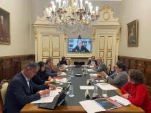 Imaxe da reunión de representantes políticos e axentes sociais